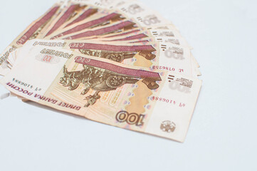 business, finance, saving, banking and people concept - close up bundle of money Russian Banknotes one hundred rubles