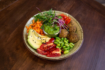 side dish with juicy vegan cutlet, vegetables in a plate