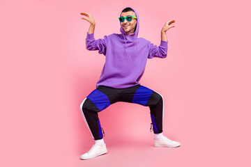 Fototapeta na wymiar Full size photo of young cheerful man hipster have fun playful grimace isolated over pink color background
