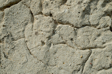 Old cracked mortar plaster close