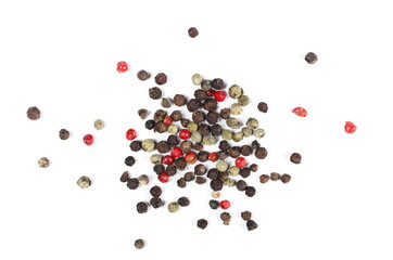 Colorful mixed pepper grains isolated on white background, top view