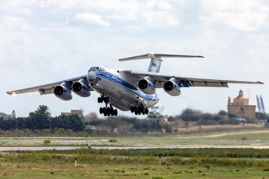 Luqa, Malta - October 12, 2021: Volga-Dnepr Airlines Ilyushin Il-76TD (REG: RA-76503) on take off to Cotonou, Benin in central Africa.