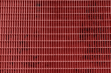 Metal grid pattern in red tone.
