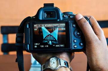 Tissue stand from the view of the digital camera. Frame within a frame of tissue paper. View of...