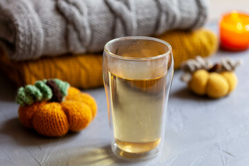 Chamomile healthy tea on grey background, close-up