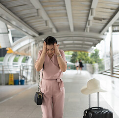 Senior woman travel tired and have a headache.