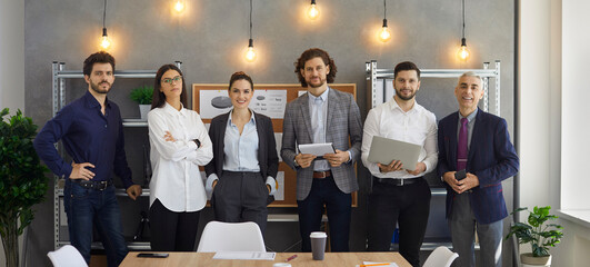 Multi-ethnic business people, group portrait of six different businessmen, four men and two women...