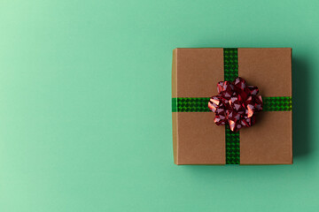 gift box. Christmas gift with space for text on plain background. Christmas concept.
