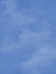 Vertical airy delicate blue background gradient texture background, delicate blue clouds banner