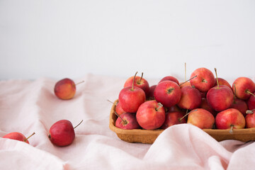 Garden, ripe, natural, mini apples in an eco bowl, selective focus