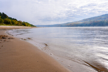 A river between two banks in autumn