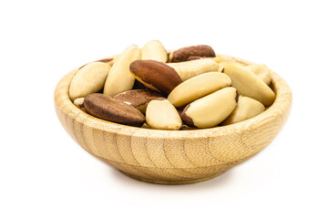 bowl with brazilian chestnut, on white insulator background. Brazil nuts known as 