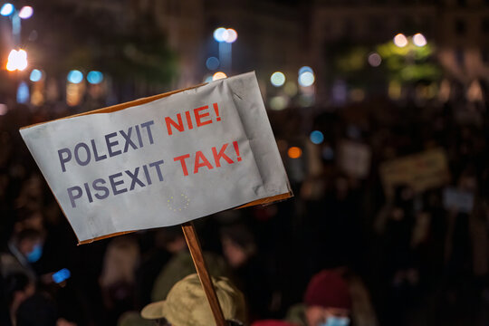Cracow, Poland - October 10, 2021: Translation of banner says Poland stays, Government leaves. People protest against verdict of Constitutional Tribunal. Many believe that verdict could result Polexit