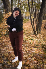 person walking in autumn park