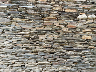 Stone wall background with vignetted borders