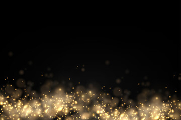 Sparkling golden magic dust particles bokeh light.