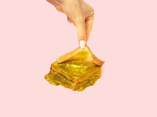 Golden sandwich with glittering in it. Bizarre concept.
