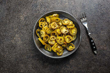 Pickled sliced jalapeno. Green jalapeno peppers