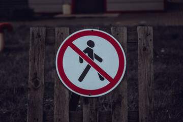 Photo stop sign for people on a wooden fence