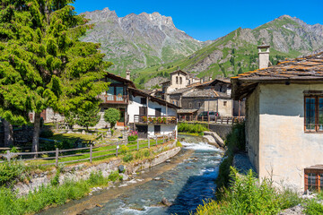 Fototapeta na wymiar The picturesque village of Chianale on a sunny summer morning, in the Varaita Valley, Piedmont, northern Italy.