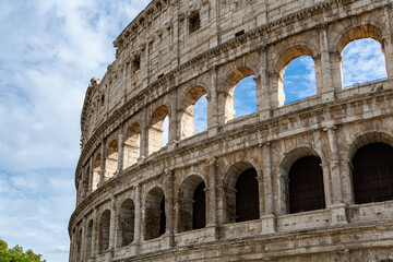 Fototapeta premium Detail of the Colosseum (Coliseum) in Rome, Italy. It is the main tourist attraction of Rome. Ancient Roman architecture and ruins of Rome in sunlight. 