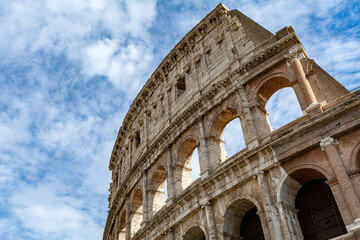 Fototapeta premium Detail of the Colosseum (Coliseum) in Rome, Italy. It is the main tourist attraction of Rome. Ancient Roman architecture and ruins of Rome in sunlight. 