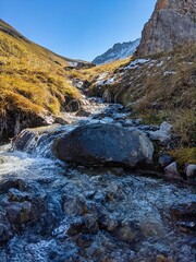 small mountain stream, river in the Swiss mountains near Davos Monstein in the canton of Graubunden. Fresh cold water