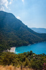 Obraz premium Kabak beach, secluded beach along Mediterranean sea near Fethiye, Turkey, located on the famous Lycian way trekking route