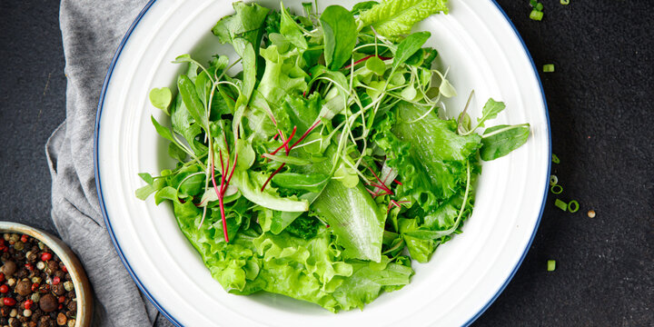 salad leaves mix fresh herbs petals vitamin aperitif fresh ready to eat meal snack on the table copy space food background rustic keto or paleo diet veggie vegan or vegetarian food no meat