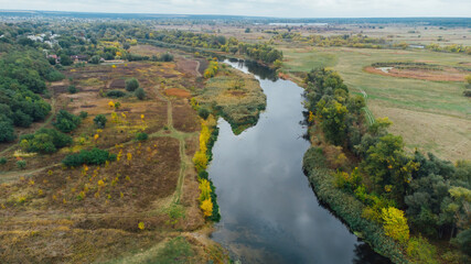 Fototapeta na wymiar Aerial landscape - wild river in autumn