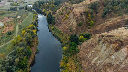 Fototapeta na wymiar Aerial landscape - wild river in autumn