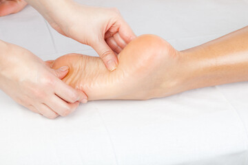 Fototapeta na wymiar Foot and legs massage