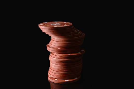Poker chips on dark background
