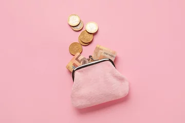 Fotobehang Small wallet with money on pink background © Pixel-Shot