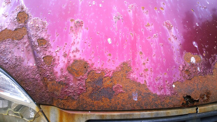 Metal corrosion of old car. Rust hole removal and repair. Rusty messy surface. Damaged grunge...
