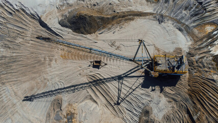 Fototapeta na wymiar Aerial view of opencast mining quarry. Industrial place view from above. pollution of ecology