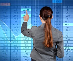 Businesswoman in stock exchange trading concept
