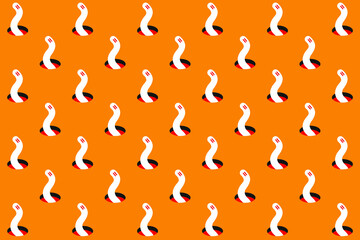 Halloween pattern worms from holes 