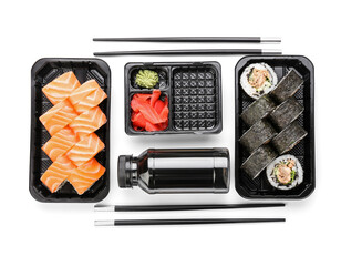 Composition with delicious sushi rolls on white background