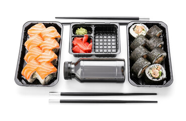 Composition with delicious sushi rolls on white background