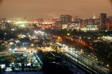 Fototapeta na wymiar Moscow, Russia. Desember 23 2020: Trains and the Moscow skyline. Ostankino railway platform.