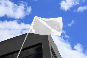 View of waving white flag outdoors