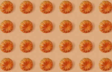 Fototapeta premium Pattern of pumpkins on orange pastel background