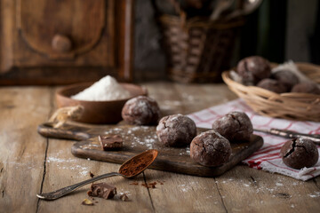 Homemade round chocolate chip cookies on a cutting board