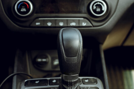 gear shift knob of a used car. Close-up, selective focus.