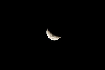 crescent moon in the dark night