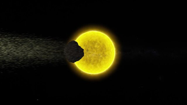 comet burning and making a tail as it comes close to the Sun. A meteor cruising by the sun with a tail of debris. A meteor orbiting the sun.