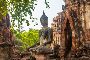 Buddha statue in the ruins of Ayutthaya Temple, Thailand