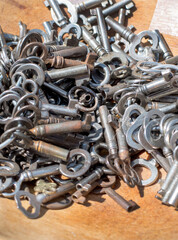 keys for old padlocks in a large pile