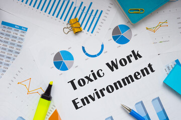 Business concept about Toxic Work Environment with sign on the sheet.